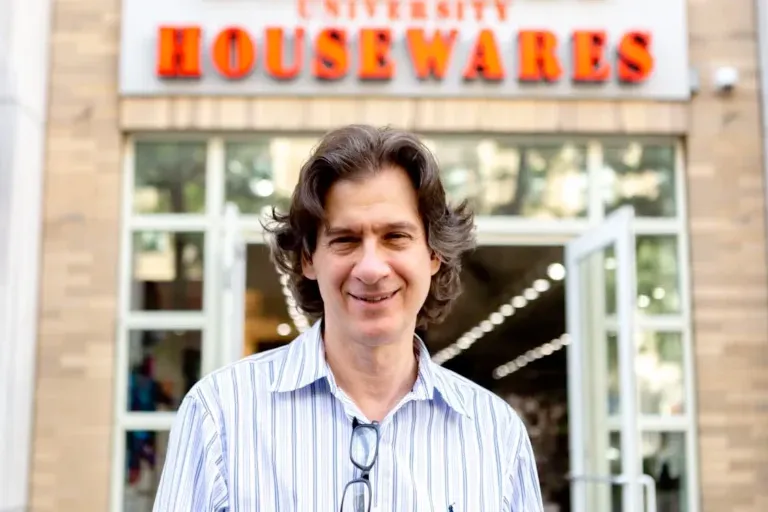 A photo of University Hardware & Housewares owner Bob Fendell in front of the store.